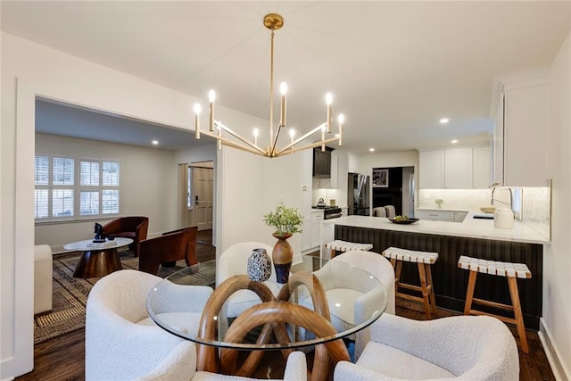 dining area with dark hardwood / wood-style flooring