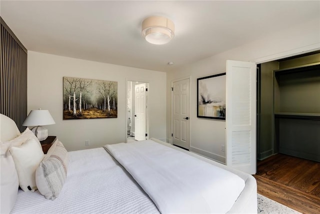 bedroom featuring hardwood / wood-style floors