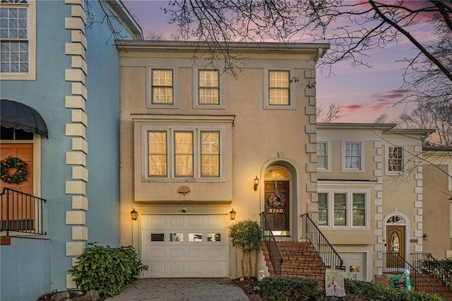 view of front of property featuring a garage