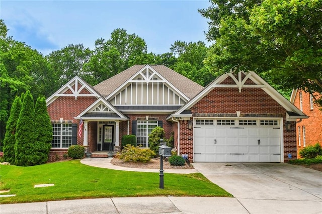 1173 Saint Charles Pl, Gainesville, GA 30501 - craftsman-style house with brick siding, concrete driveway, an attached garage, and a front lawn