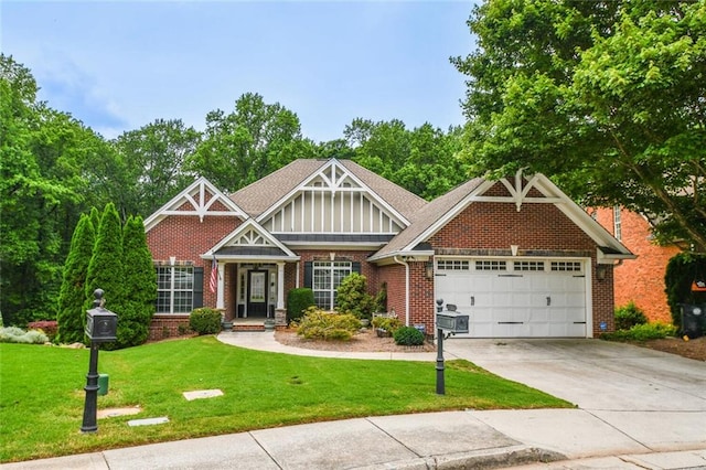 1173 Saint Charles Pl, Gainesville, GA 30501 - craftsman-style house with an attached garage, driveway, a front yard, and brick siding