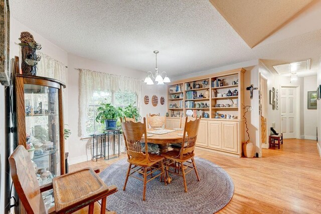 living room with a fireplace, wood-type flooring, ceiling fan, and lofted ceiling