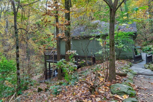 view of side of home featuring a deck