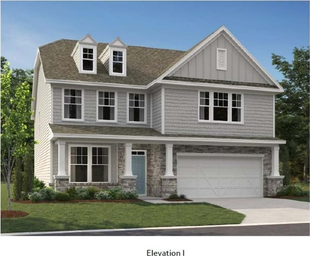 craftsman-style home with stone siding, board and batten siding, concrete driveway, a front yard, and a garage