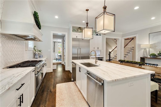 kitchen featuring a sink, high quality appliances, custom exhaust hood, backsplash, and dark wood finished floors