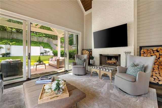 sunroom with plenty of natural light and lofted ceiling