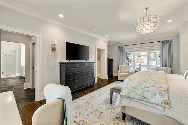 bedroom with crown molding, baseboards, recessed lighting, and wood finished floors
