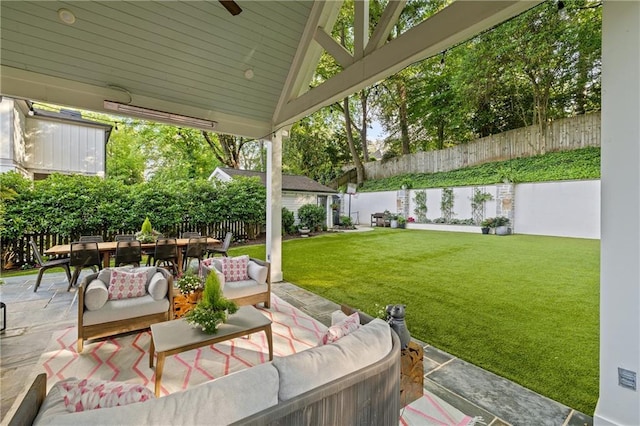 view of patio with outdoor dining area and an outdoor living space