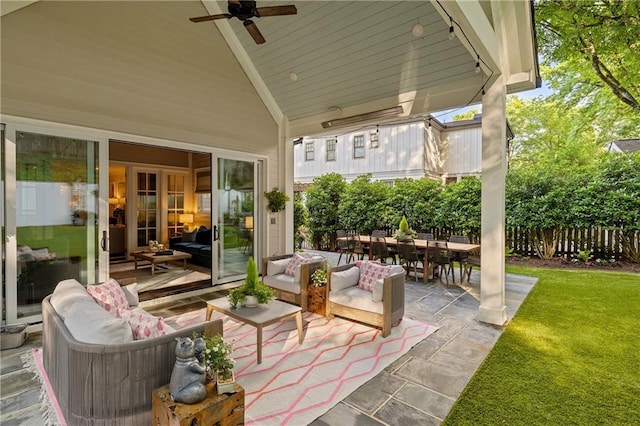 view of patio featuring outdoor dining space, ceiling fan, and outdoor lounge area