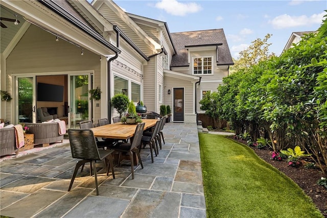 view of patio featuring outdoor dining space and an outdoor hangout area