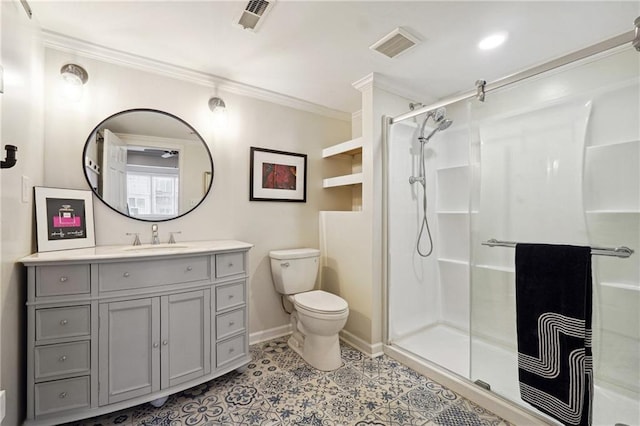 bathroom featuring toilet, a shower with door, vanity, and ornamental molding