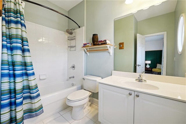 full bathroom with tile patterned flooring, vanity, toilet, and shower / tub combo