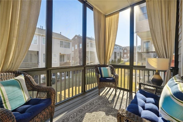 sunroom / solarium featuring a wealth of natural light