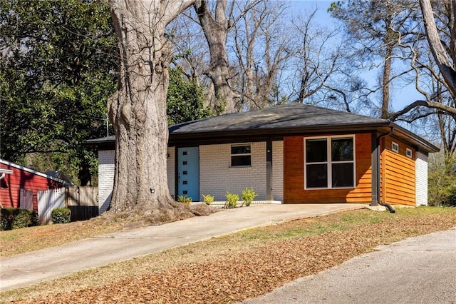 view of front of home with brick siding