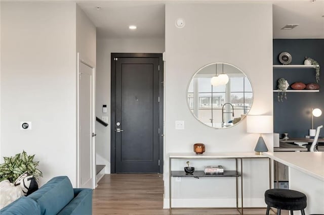 22 Airline St NE Unit 403, Atlanta, GA 30312 - foyer entrance with wood finished floors and stairway