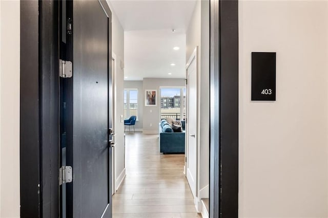 22 Airline St NE Unit 403, Atlanta, GA 30312 - corridor featuring light wood-style flooring, baseboards, and recessed lighting