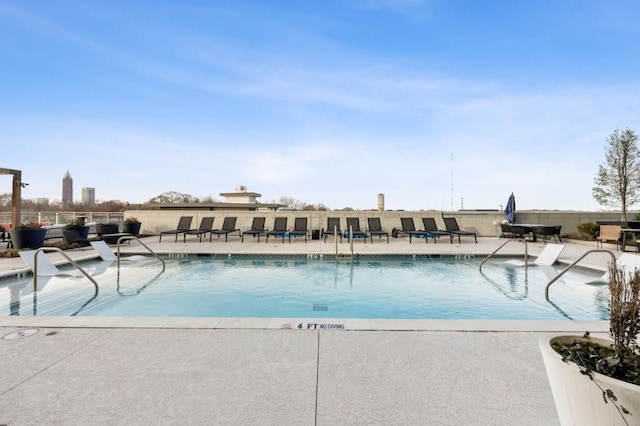 view of pool featuring a patio