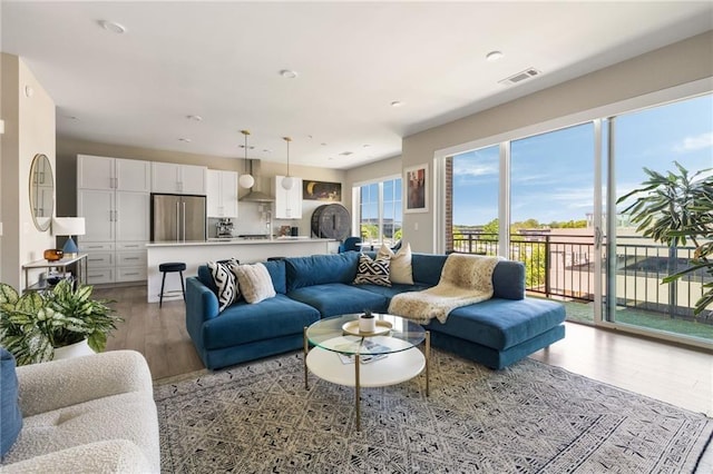 22 Airline St NE Unit 403, Atlanta, GA 30312 - living area featuring light wood-style floors