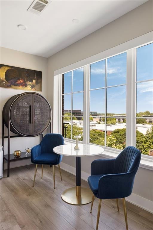22 Airline St NE Unit 403, Atlanta, GA 30312 - sitting room featuring baseboards and wood finished floors