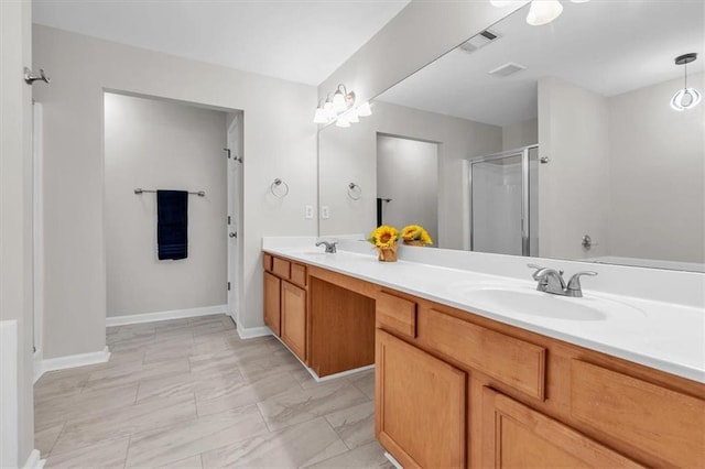 bathroom featuring double vanity, visible vents, a shower stall, and a sink