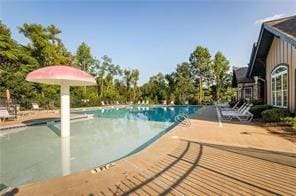 pool with a patio area