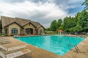 pool with a patio
