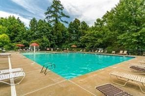 pool featuring a patio area
