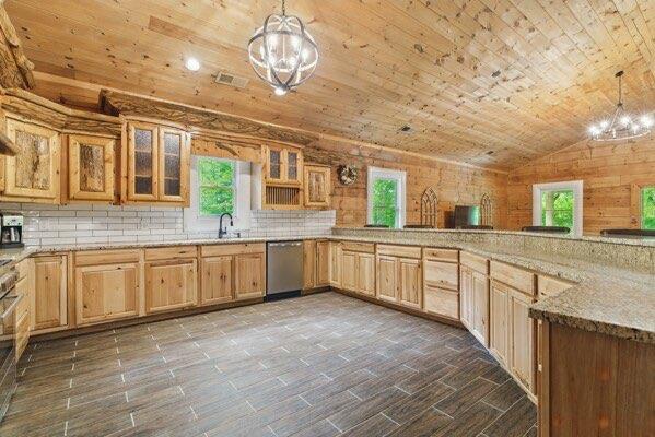 230 Old Mill White Ext, Jasper, GA 30143 - kitchen featuring wooden ceiling, stainless steel dishwasher, a chandelier, vaulted ceiling, and plenty of natural light
