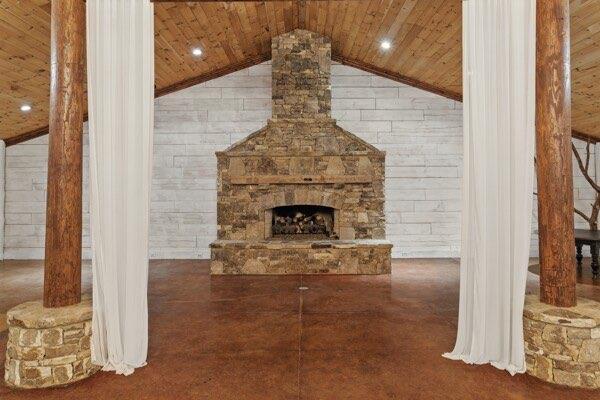 230 Old Mill White Ext, Jasper, GA 30143 - unfurnished living room featuring wood ceiling and vaulted ceiling