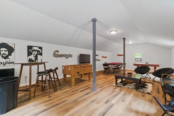 230 Old Mill White Ext, Jasper, GA 30143 - rec room with lofted ceiling, wood finished floors, and baseboards