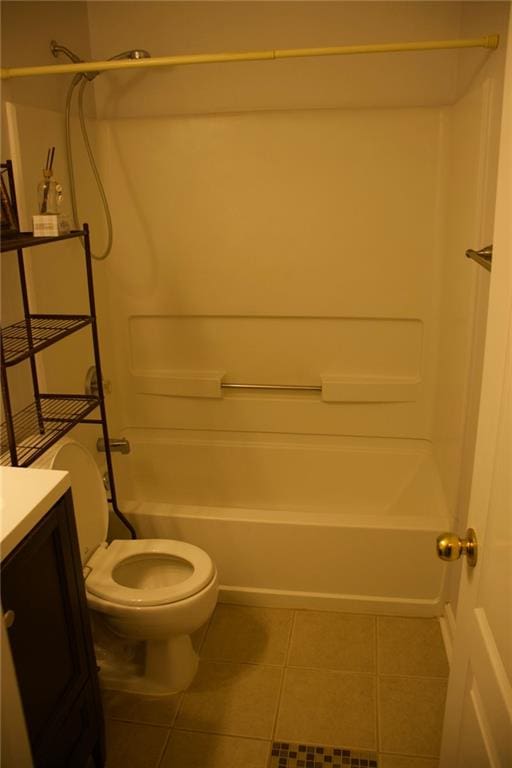 full bathroom with tile patterned flooring, vanity, shower / tub combination, and toilet