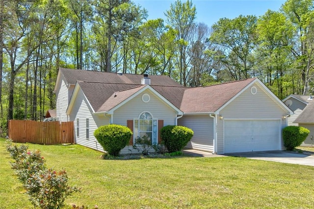 ranch-style house with a garage and a front lawn