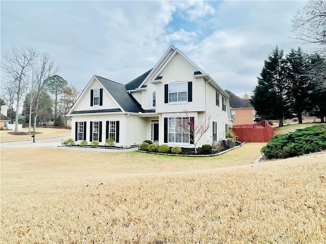 view of front of house with a front lawn