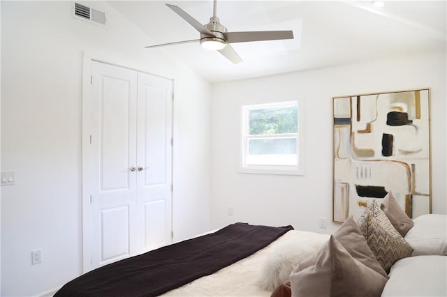 bedroom with lofted ceiling and ceiling fan