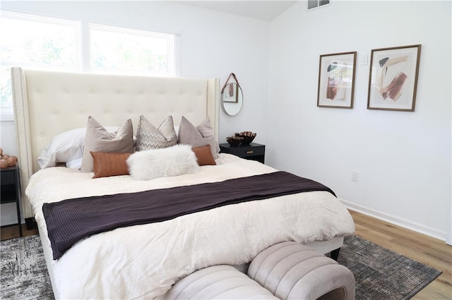 bedroom featuring hardwood / wood-style flooring