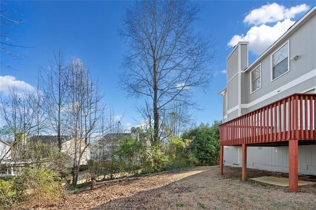 view of yard with a deck