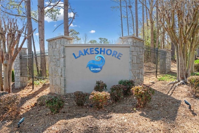 community sign with fence