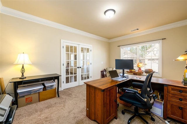 office featuring french doors, light colored carpet, visible vents, and ornamental molding