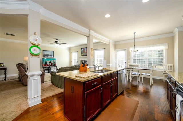 kitchen with a sink, stainless steel dishwasher, dark wood-style floors, reddish brown cabinets, and ornate columns