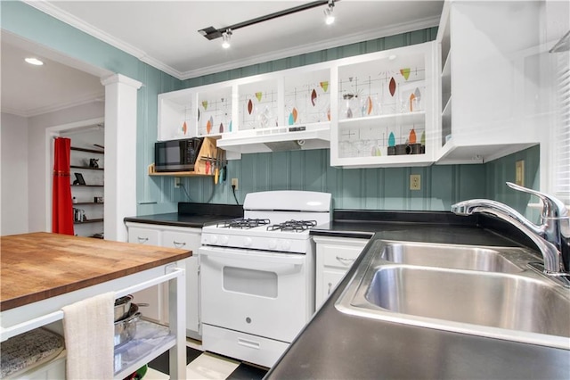 kitchen featuring white cabinets, a sink, under cabinet range hood, black microwave, and white range with gas cooktop