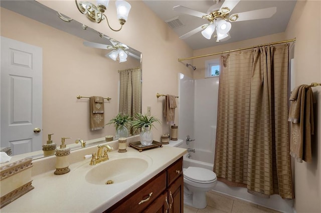 full bathroom featuring shower / bath combo, tile patterned floors, vanity, ceiling fan, and toilet