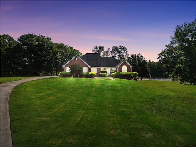 70 Lake Charles Xing, Covington, GA 30016 - traditional-style home with a front yard