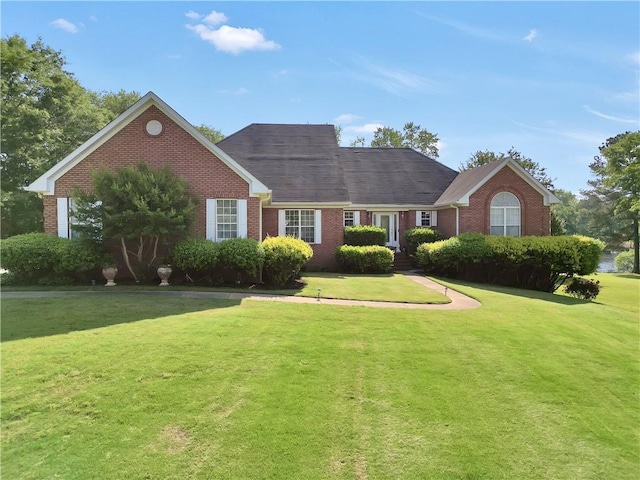 70 Lake Charles Xing, Covington, GA 30016 - single story home with brick siding and a front lawn