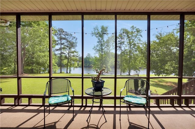 70 Lake Charles Xing, Covington, GA 30016 - sunroom / solarium featuring a water view and view of scattered trees