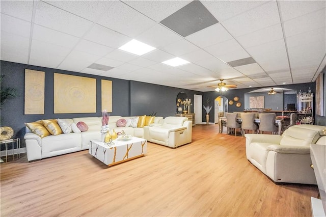 70 Lake Charles Xing, Covington, GA 30016 - living room with wood finished floors, a drop ceiling, and ceiling fan