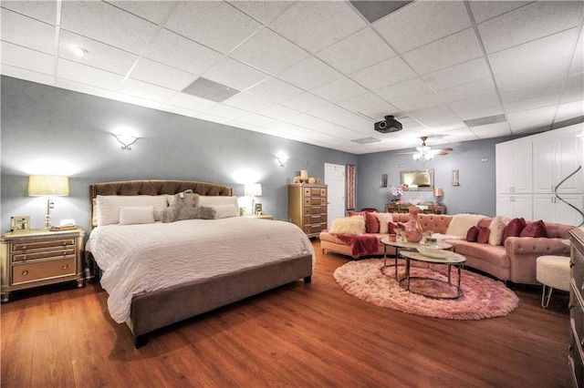 70 Lake Charles Xing, Covington, GA 30016 - bedroom featuring wood finished floors, a ceiling fan, and a paneled ceiling