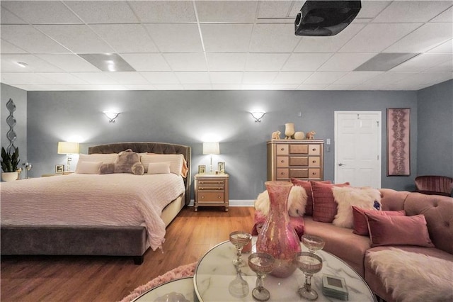 70 Lake Charles Xing, Covington, GA 30016 - bedroom featuring wood finished floors and a drop ceiling
