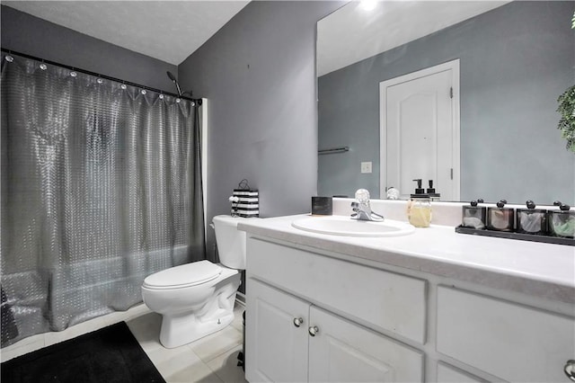 70 Lake Charles Xing, Covington, GA 30016 - bathroom with toilet, vanity, tile patterned floors, and shower / bath combo with shower curtain