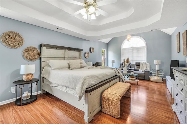 70 Lake Charles Xing, Covington, GA 30016 - bedroom with wood finished floors, a raised ceiling, baseboards, and ceiling fan