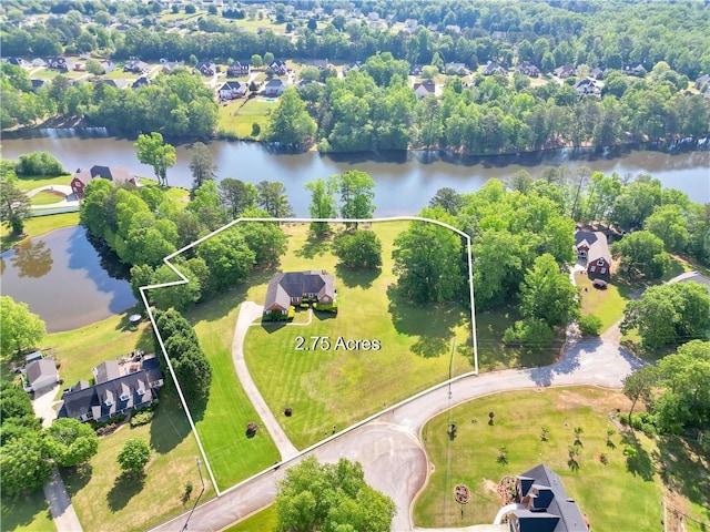 70 Lake Charles Xing, Covington, GA 30016 - aerial perspective of suburban area with a large body of water and property parcel outlined